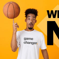 athlete with basketball with "game changer" written on shirt